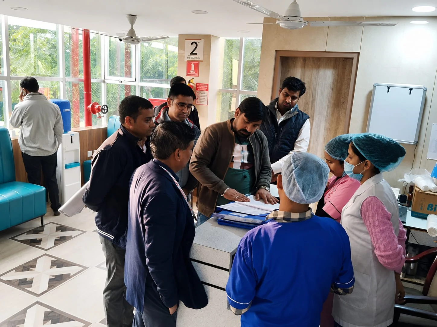Mudgal Healthcare consultant reviewing hospital processes with clinical and operational staff